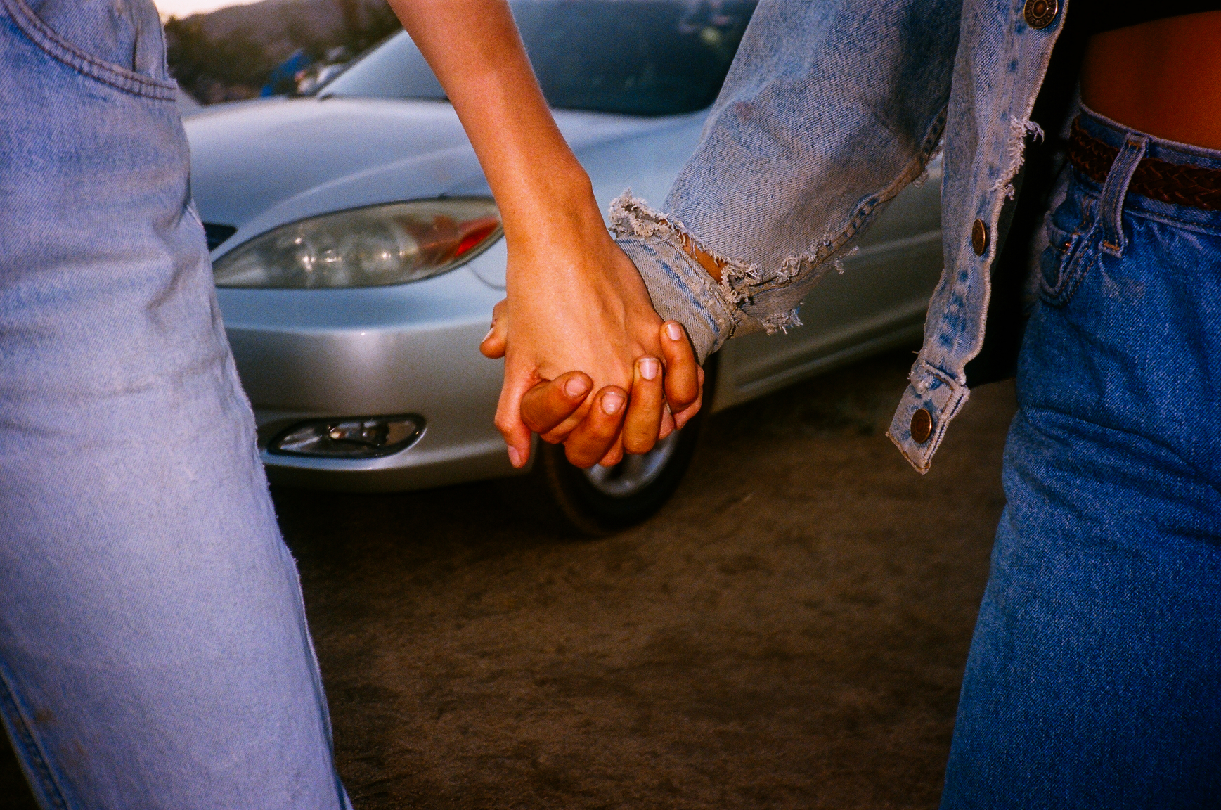 Two girls holding hands