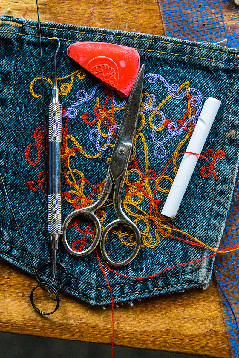 Denim pocket in the process of being embroidered by Fort Lonesome