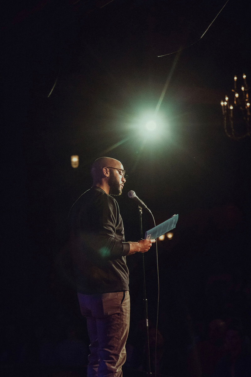 Dr. Clint Smith at a poetry reading