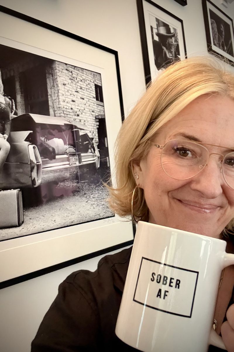 Brené Brown holding mug sober AF