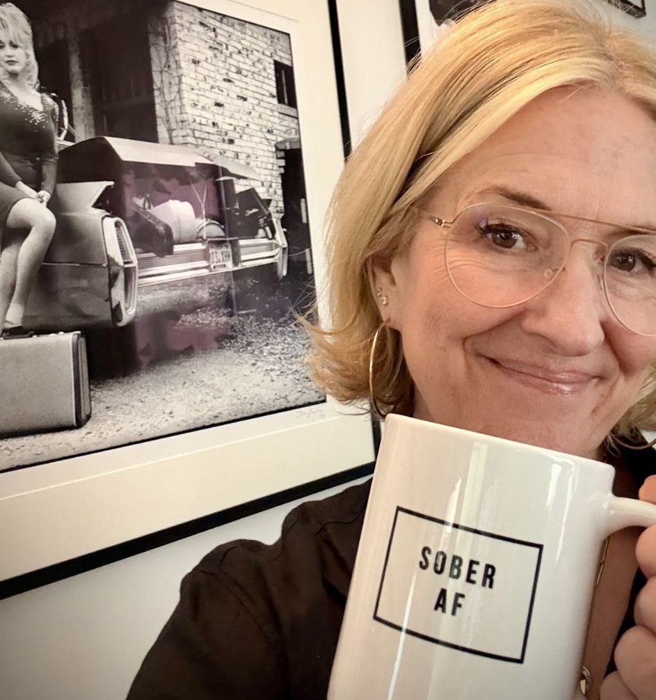 Brené Brown holding mug sober AF